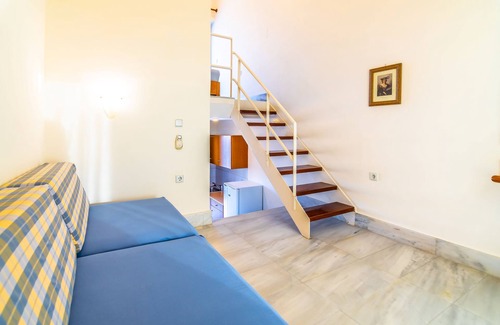 Stalos Apartment | Tranquil Orestis Studio: Oceanfront Stay with Pool & Kitchen