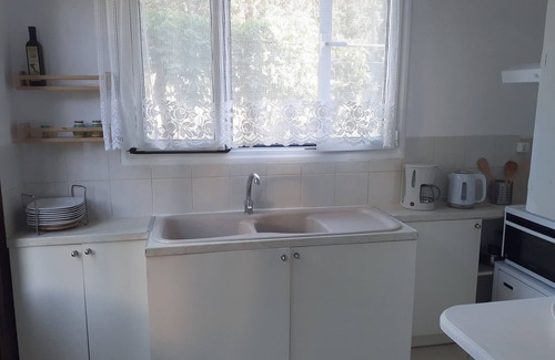 Agios Gordios Apartment | Family-Friendly Orfeas Apartment with Kitchen & Great Reviews