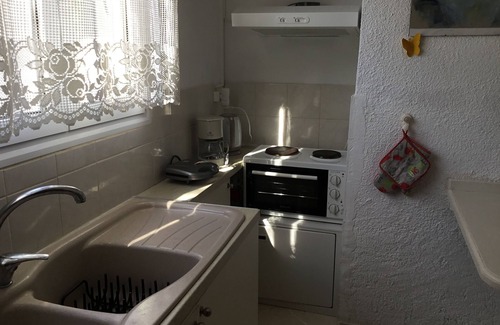 Agios Gordios Apartment | Family-Friendly Orfeas Apartment with Kitchen & Great Reviews