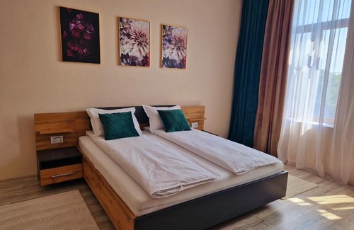 Arad Apartment | Family-Friendly ORI Apart in Malul Muresului - Rated 9.9!