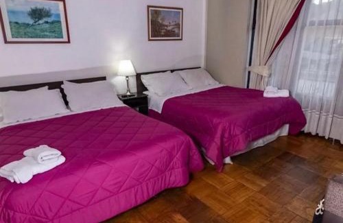 Talca House | Budget-Friendly Oriente Hostal with Hot Tub & Breakfast