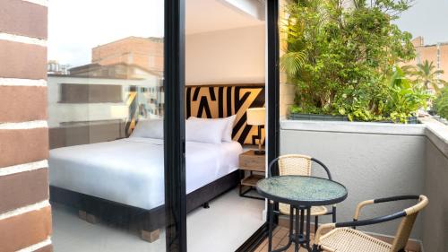 Laureles - Estadio Hotel | Discover Origen Local Suites: Guest Rated 9/10 & Family-Friendly