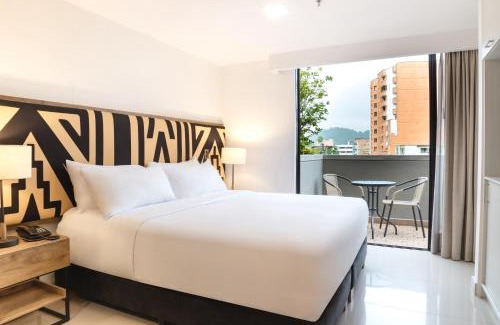 Laureles - Estadio Hotel | Discover Origen Local Suites: Guest Rated 9/10 & Family-Friendly