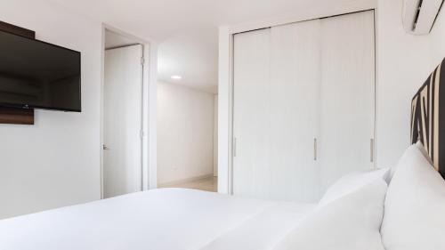 Laureles - Estadio Hotel | Discover Origen Local Suites: Guest Rated 9/10 & Family-Friendly