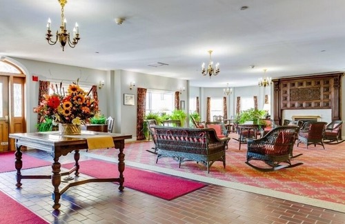Chautauqua Condo | Originally built in Chautauqua Institution in 1890, the original St. Elmo Hotel building was torn down and rebuilt as a residential condominium. It now offers the convenience of an elevator