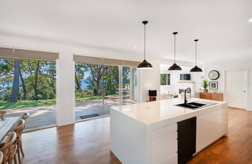 Vincentia House | Orions Ultimate Oasis: Beachfront Retreat with Spa & Pool