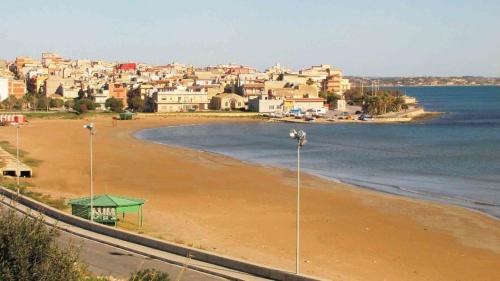 Pozzallo Apartment | Orizzonte Casesicule: Oceanfront Oasis with Stunning Views