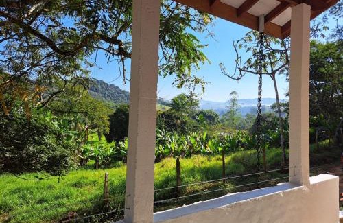Monteiro Lobato House | Serene Orobó Kaá: Forest Retreat with Ocean View & Pool
