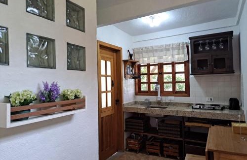 Monteiro Lobato House | Serene Orobó Kaá: Forest Retreat with Ocean View & Pool