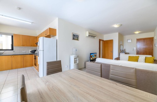 Oroklini Apartment | Oroklini - Breathtaking Poolside Retreat with Ocean Views