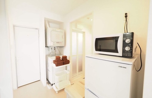 Naha Apartment | Cozy Retreat Near Oroku Station with Family-Friendly Amenities