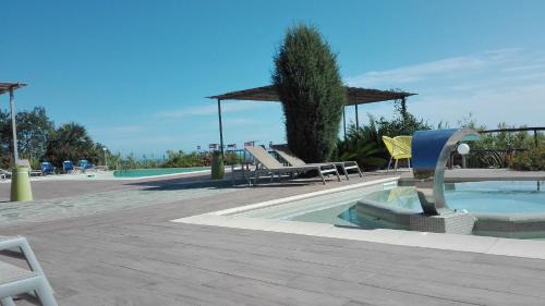 Torre del Mare Hotel | Oroverde: Pet-Friendly Retreat with Oceanfront Views
