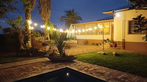 Damaraland Apartment | Experience Orpheus Inn: Pool, Kitchen & Top Guest Ratings