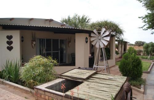 Damaraland Apartment | Experience Orpheus Inn: Pool, Kitchen & Top Guest Ratings