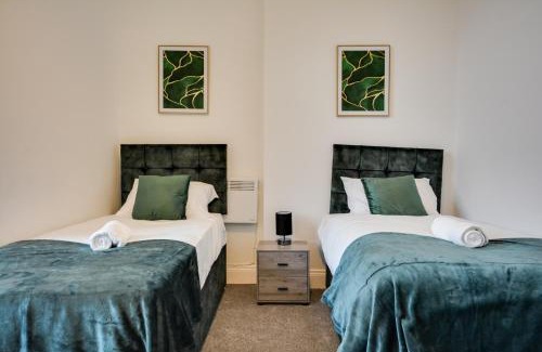 Wigan Apartment | Orrell Apartment: Family-Friendly Stay with Free Parking