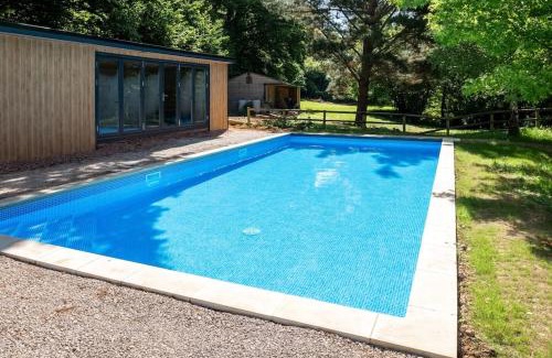 Holcombe Burnell House | Osbornes Holiday House: Family-Friendly Oasis with Pool