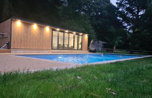 Holcombe Burnell House | Osbornes Holiday House: Family-Friendly Oasis with Pool