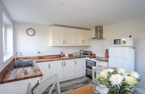 Brynsiencyn Cottage | Oscar's Pad: Pet-Friendly Retreat with Cozy Open Fire