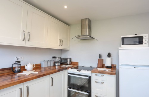 Brynsiencyn Cottage | Oscar's Pad: Pet-Friendly Retreat with Cozy Open Fire