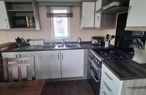 St George House | Discover Oscars Caravan at Whitehouse Leisure Park, Towyn