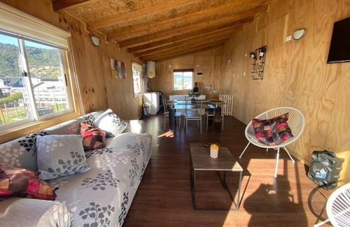 Pucatrihue Apartment | Osorno Cabaña: Pet-Friendly Retreat by River and Ocean