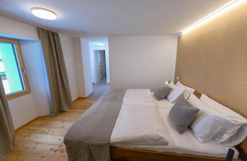 Bedretto Hotel | Discover Comfort at Osteria Bäkar - Pet Friendly & Accessible