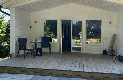 Timmernabben Cottage | Discover Ostkustens Riviera: Poolside Oceanfront Retreat