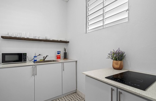 Sagrado Corazon Apartment | Welcoming Otium Rentals San Juan City Apartment with Arcade