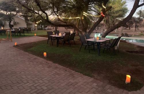 Otjiwarongo Cabin | Otjibamba Lodge: Oceanfront Retreat with Pool & Dining