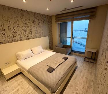 Zeytinburnu Apartment | Ottomare Suites: Oceanfront Retreat with Private Pool