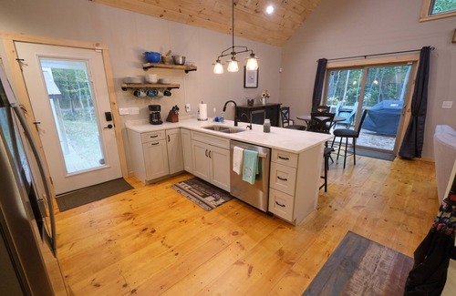 Mears House | Discover Our Neck of the Woods: EV-Friendly Retreat Awaits