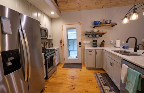 Mears House | Discover Our Neck of the Woods: EV-Friendly Retreat Awaits