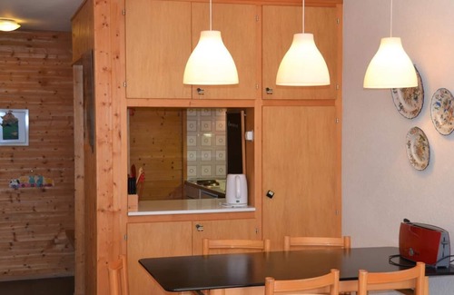 St. Luc Apartment | Perfect Getaway: 4-Person Flat with Balcony & Dining Area
