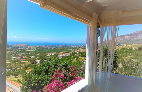 Saronikos House | Unforgettable Oceanfront Stay with Panoramic Beach Views