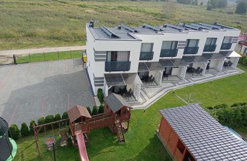 Mielno Cabin | Scenic Over Lake: Family-Friendly Apartments with Great Reviews