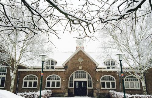 Municipality of Enschede House | Experience Comfort at the Historic West-Indiëschool Hotel