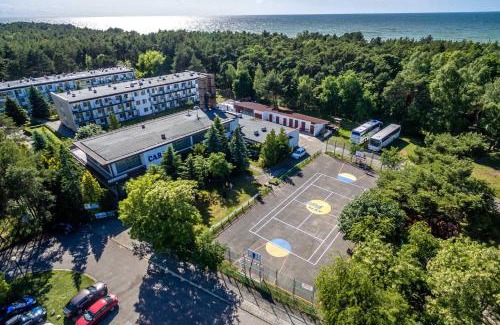 Darlowo Resort | Discover OW Carbo Dąbki: Nature Retreat by Lake and Forest