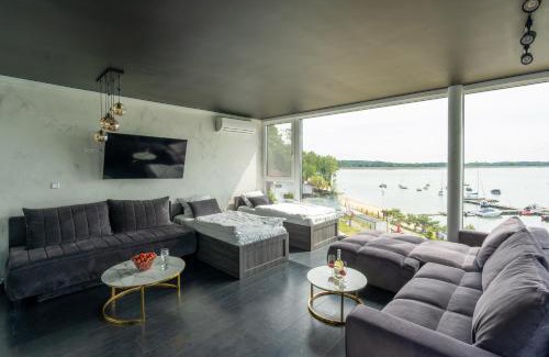 Skorochow Resort | Cozy OW Mewa: Lakeside Apartments with Ocean Views