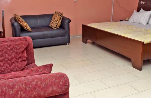 Lagos Apartment | Relax at Owee Suites: 4-Star Pool & Spa Experience