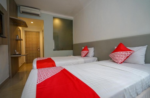 Palembang Hotel | Budget-Friendly OYO 1273 Hotel Belvena - Child Friendly Stay