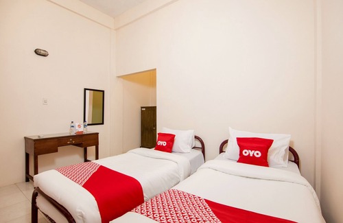 Rantauprapat Hotel | Family-Friendly Stay at OYO 2069 Wisma Syariah Kampung Baru