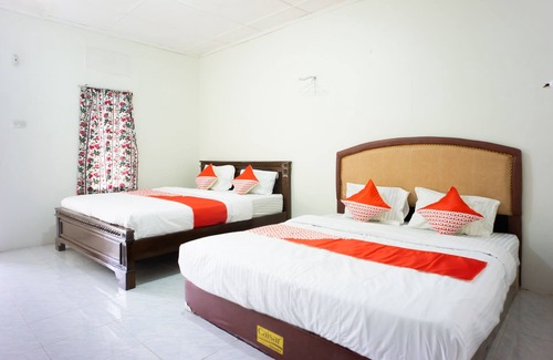 Babul Makmur Hotel | Discover OYO 2410 Intan Hotel with Family-Friendly Amenities