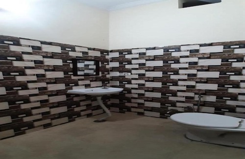Bareilly Hotel | Discover OYO 82700 Hotel Imperial Lawn with Pool & Breakfast