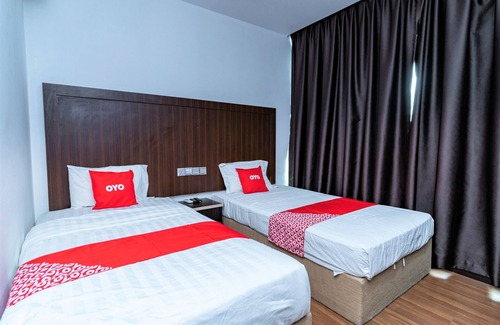 Bintulu Hotel | Budget-Friendly Stay at OYO 90375 Reggae Inn with Breakfast