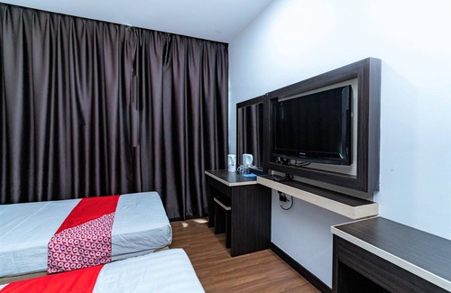 Bintulu Hotel | Budget-Friendly Stay at OYO 90375 Reggae Inn with Breakfast