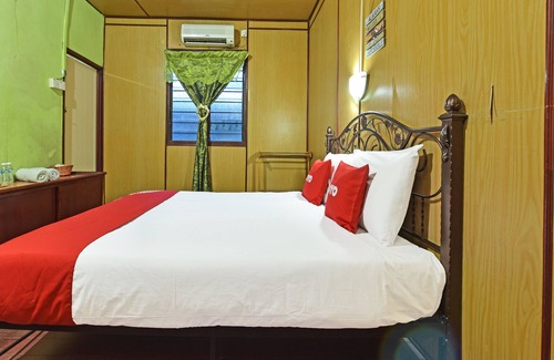 Kuala Tahan Hotel | Cozy OYO 90620 Mahseer Chalet with Breakfast & Family Fun