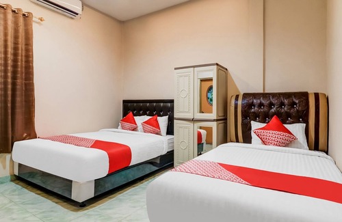 Jambi Hotel | OYO 91021 Steze Kost & Guest House Syariah