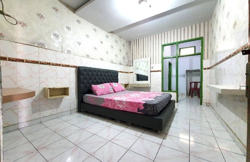 Jambi Hotel | Budget-Friendly Stay at OYO 91077 Losmen Bunda Arema