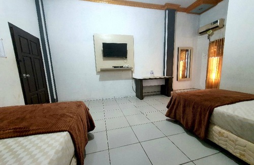 Sarolangun Hotel | Budget-Friendly Stay at OYO 91097 Hotel Atika with Breakfast