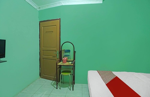 Batam Hotel | Cozy OYO 92496 Faraas Homestay with Breakfast & Family Fun